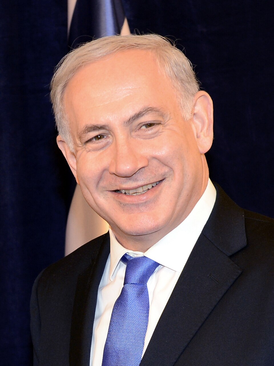 Photo of Benjamin Netanyahu (official portrait) in a crooked glitter circle